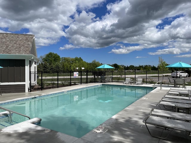 W214N4987 Casey Ct, Menomonee Falls, WI 53051 - community pool featuring a patio area