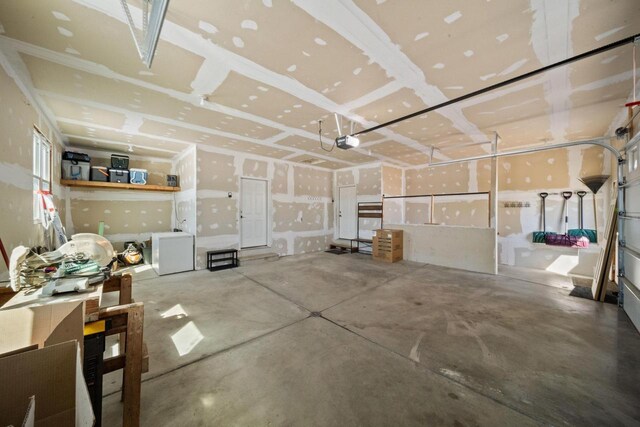 8464 County Rd S, Pulaski, WI 54162 - garage with a garage door opener