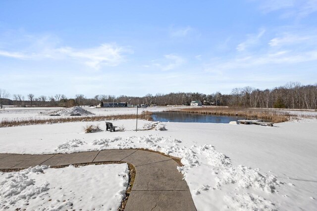 8464 County Rd S, Pulaski, WI 54162 - yard covered in snow featuring a water view