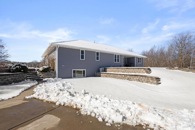 8464 County Rd S, Pulaski, WI 54162 - view of snow covered rear of property