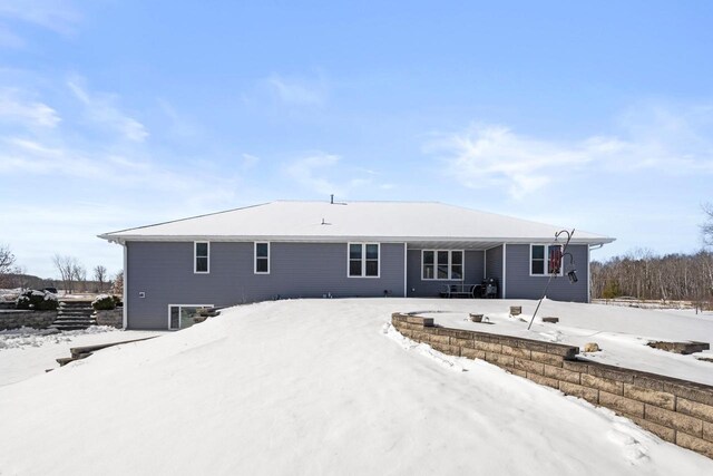 8464 County Rd S, Pulaski, WI 54162 - view of snow covered back of property