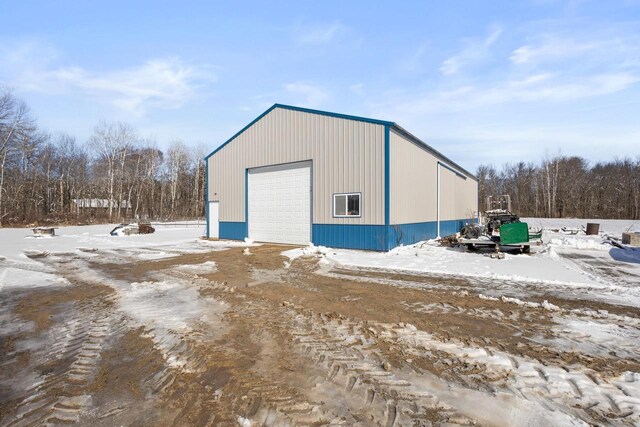 8464 County Rd S, Pulaski, WI 54162 - snow covered structure featuring an outdoor structure