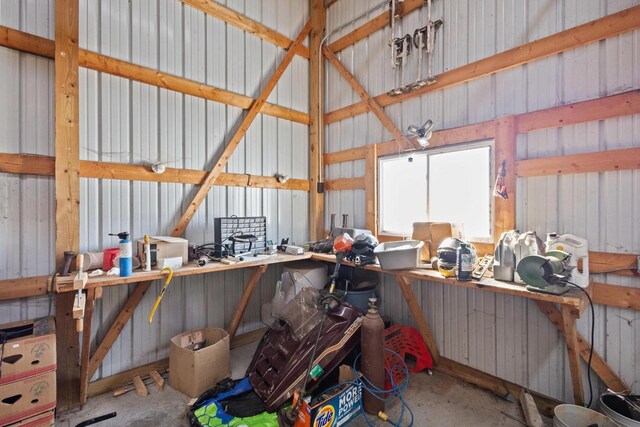 8464 County Rd S, Pulaski, WI 54162 - garage featuring metal wall