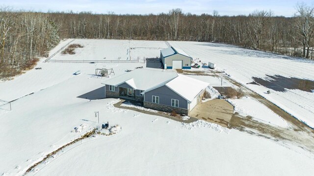 8464 County Rd S, Pulaski, WI 54162 - snowy aerial view featuring a forest view