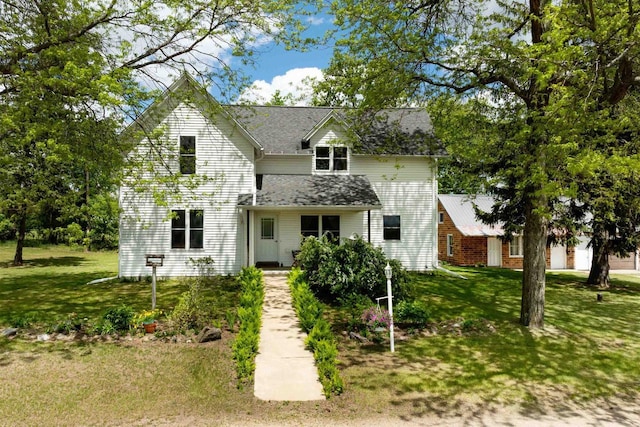 N402 24th Ave, Neshkoro, WI 54960 - traditional-style house with a front yard and a shingled roof