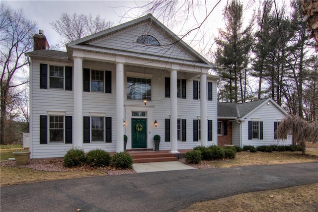 3736 Forest Knoll Dr, Eau Claire, WI 54701 - neoclassical / greek revival house with a chimney