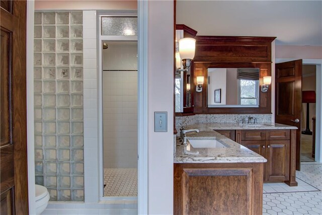 3736 Forest Knoll Dr, Eau Claire, WI 54701 - full bath featuring toilet, tile patterned floors, a walk in shower, and vanity
