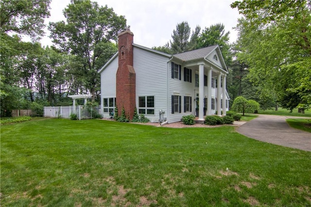 3736 Forest Knoll Dr, Eau Claire, WI 54701 - view of front facade featuring a chimney and concrete driveway