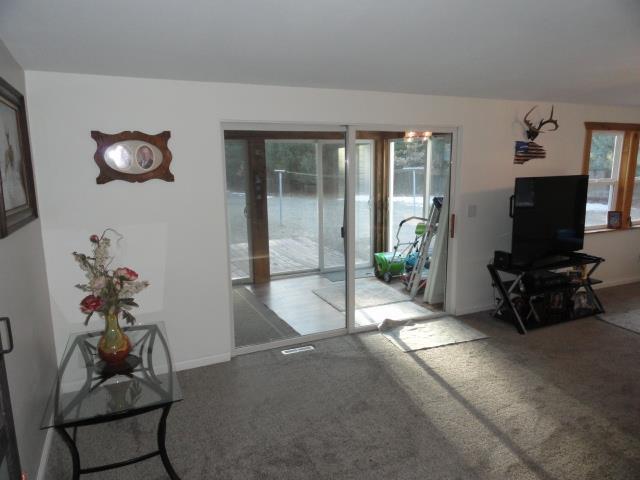 interior space featuring baseboards