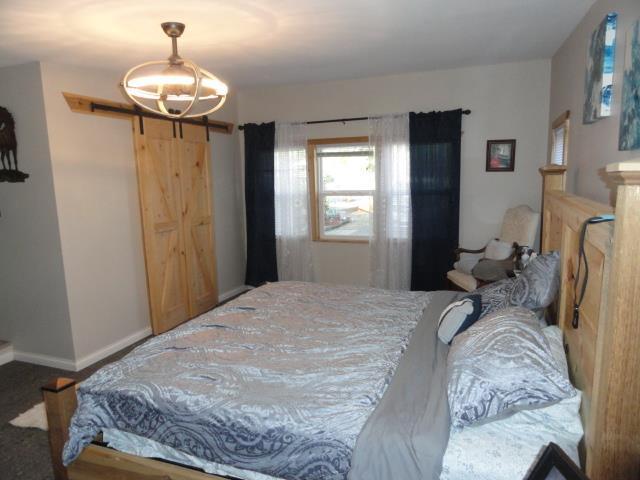 bedroom featuring baseboards
