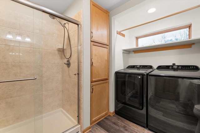 1646 N Friess Lake Dr, Hubertus, WI 53033 - laundry room featuring dark wood-type flooring, laundry area, recessed lighting, and washer and dryer