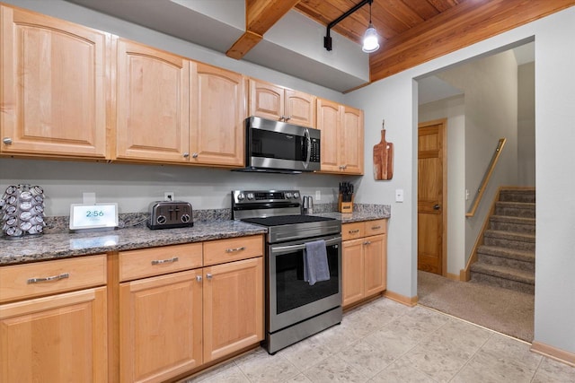 1646 N Friess Lake Dr, Hubertus, WI 53033 - kitchen featuring baseboards, light brown cabinetry, dark stone counters, stainless steel appliances, and wood ceiling