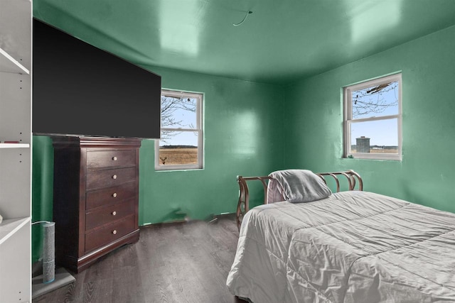 7760 State Highway 186, Arpin, WI 54410 - bedroom featuring dark wood-type flooring