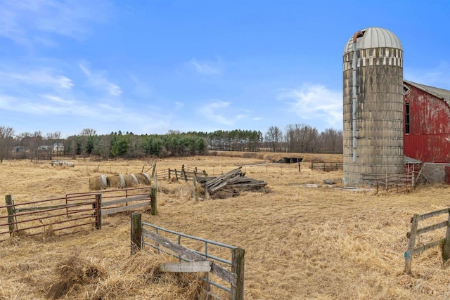 7760 State Highway 186, Arpin, WI 54410 - view of yard featuring an outdoor structure, a rural view, fence, and a barn