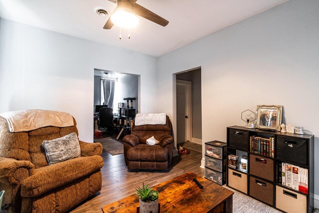 2214 N 40th St, Milwaukee, WI 53208 - living room featuring visible vents, wood finished floors, and ceiling fan