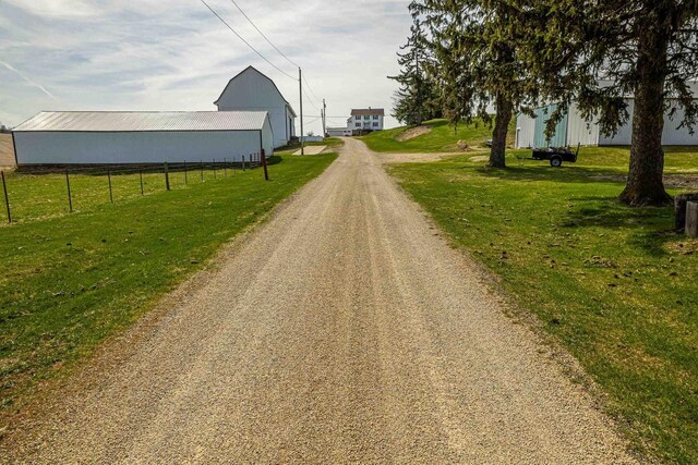 1943 State Road 11, South Wayne, WI 53587 - view of road with a pole building and driveway