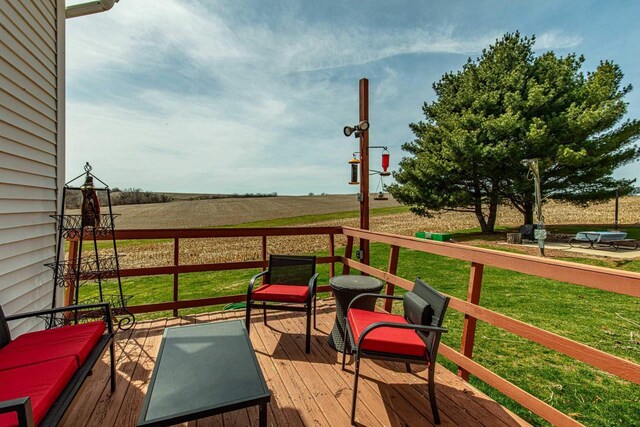 1943 State Road 11, South Wayne, WI 53587 - wooden deck with a lawn and a rural view