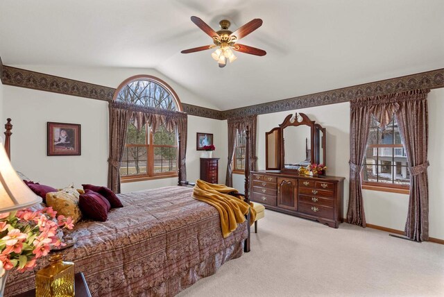 N8891 Gladstone Beach Rd, Fond Du Lac, WI 54937 - bedroom with visible vents, a ceiling fan, baseboards, carpet flooring, and vaulted ceiling