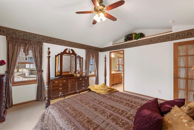 N8891 Gladstone Beach Rd, Fond Du Lac, WI 54937 - bedroom featuring a ceiling fan, vaulted ceiling, baseboards, light carpet, and ensuite bath