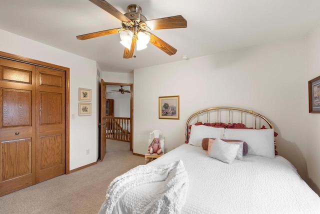 N8891 Gladstone Beach Rd, Fond Du Lac, WI 54937 - bedroom with baseboards, ceiling fan, and light carpet