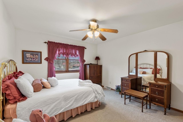 N8891 Gladstone Beach Rd, Fond Du Lac, WI 54937 - carpeted bedroom with visible vents, a ceiling fan, and baseboards