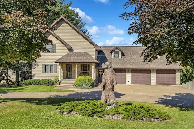957 Whispering Ln, Hazel Green, WI 53811 - view of front of property with concrete driveway, a front lawn, roof with shingles, and an attached garage