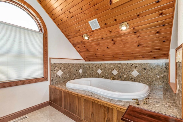 957 Whispering Ln, Hazel Green, WI 53811 - full bath with wood ceiling, lofted ceiling, tile patterned flooring, a bath, and visible vents