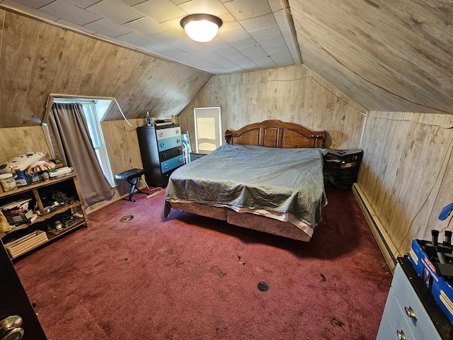 233 Highland St, Belmont, WI 53510 - carpeted bedroom featuring a baseboard radiator, wood walls, and vaulted ceiling