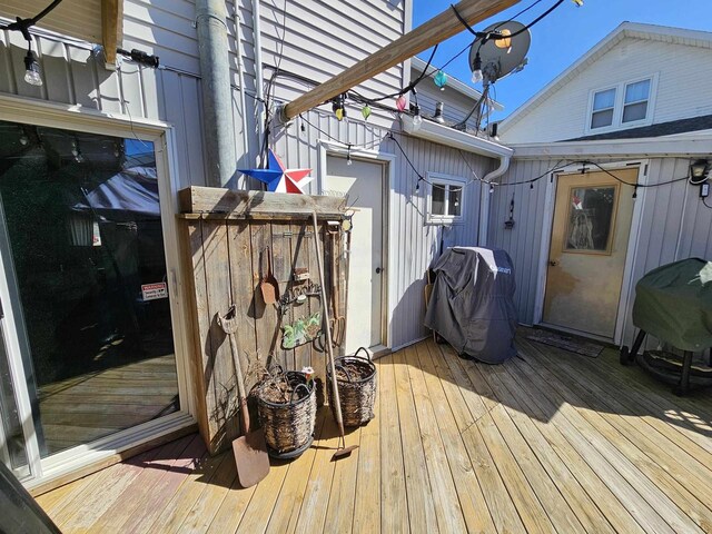 233 Highland St, Belmont, WI 53510 - wooden deck featuring grilling area