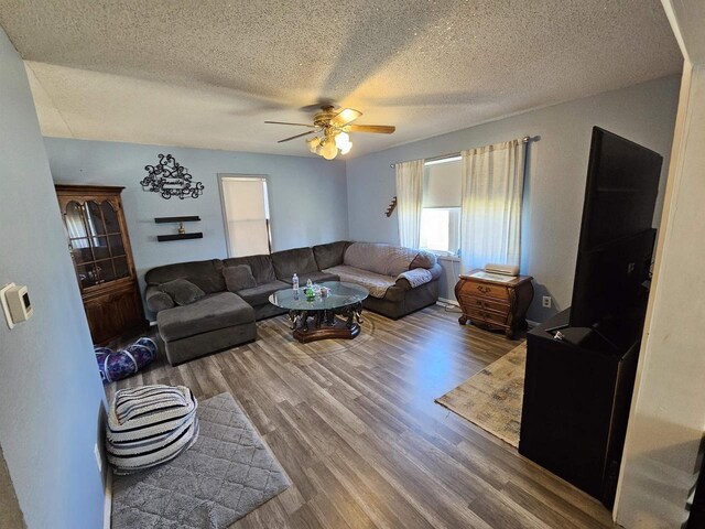233 Highland St, Belmont, WI 53510 - living room with a textured ceiling, wood finished floors, and a ceiling fan