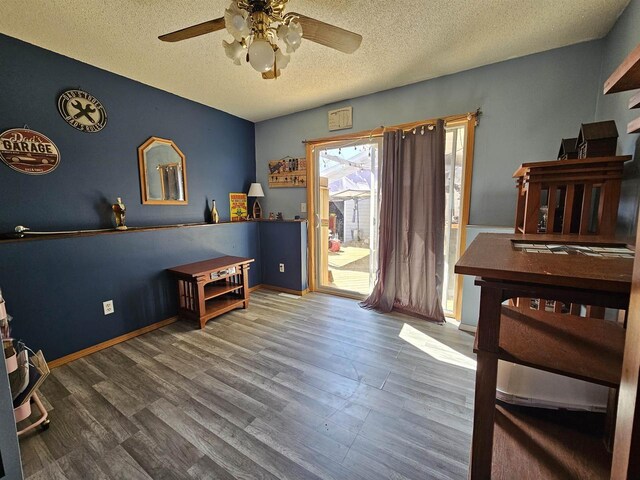 233 Highland St, Belmont, WI 53510 - interior space with a textured ceiling, baseboards, ceiling fan, and wood finished floors