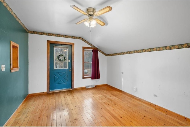 8375 N Bass Lake Rd, Danbury, WI 54830 - additional living space featuring visible vents, hardwood / wood-style flooring, baseboards, a ceiling fan, and lofted ceiling