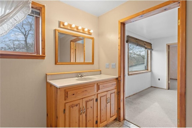 8375 N Bass Lake Rd, Danbury, WI 54830 - bathroom with baseboards and vanity