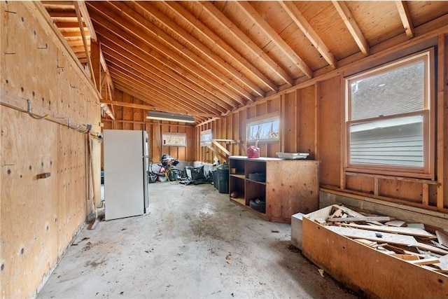 8375 N Bass Lake Rd, Danbury, WI 54830 - miscellaneous room with unfinished concrete floors and vaulted ceiling