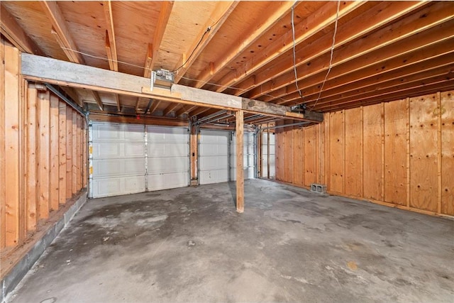 8375 N Bass Lake Rd, Danbury, WI 54830 - garage with wooden walls