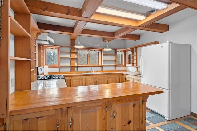 8375 N Bass Lake Rd, Danbury, WI 54830 - kitchen with coffered ceiling, a sink, open shelves, freestanding refrigerator, and wooden counters