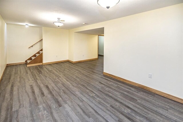 836 Westwind Dr, Black River Falls, WI 54615 - finished basement featuring baseboards, wood finished floors, and stairway