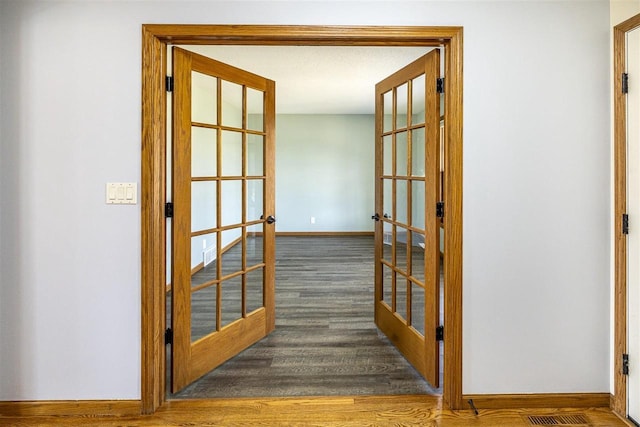 836 Westwind Dr, Black River Falls, WI 54615 - corridor featuring french doors and baseboards