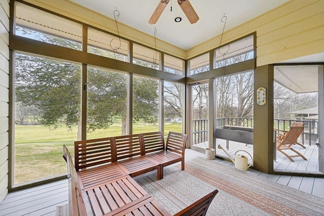 sunroom / solarium with ceiling fan