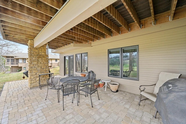 view of patio featuring outdoor dining space