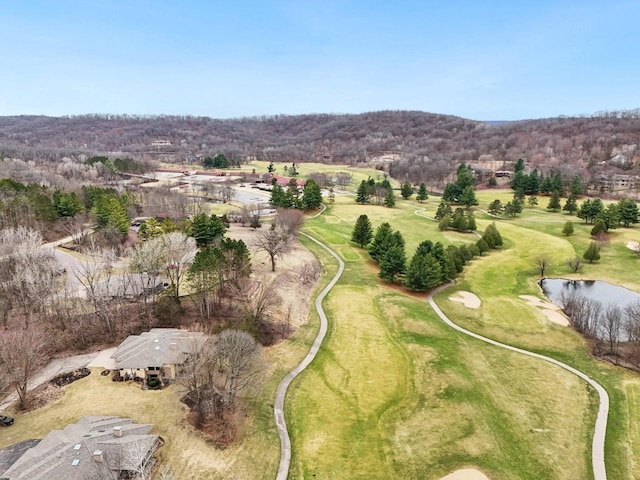 aerial view featuring golf course view and a water view