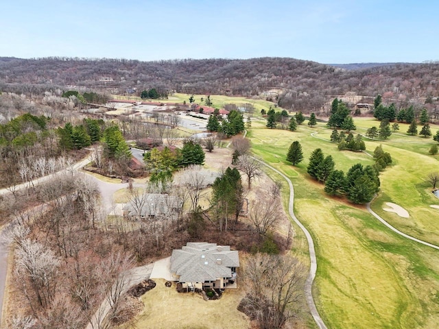 birds eye view of property with view of golf course