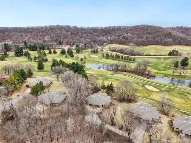 drone / aerial view featuring a water view and golf course view