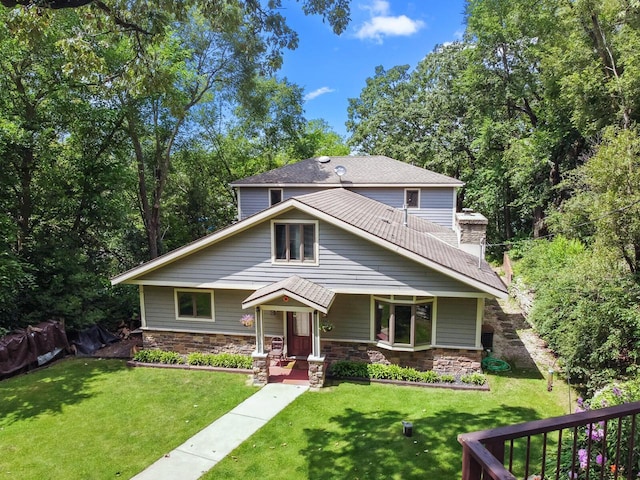 W1260 S Shore Dr, Palmyra, WI 53156 - view of front facade featuring stone siding and a front yard