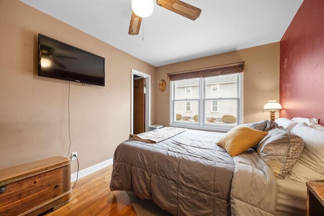 505 S Main St, Edgerton, WI 53534 - bedroom with baseboards, ceiling fan, and light wood finished floors