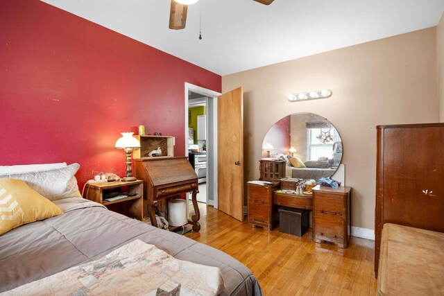 505 S Main St, Edgerton, WI 53534 - bedroom featuring a ceiling fan, light wood-style flooring, and baseboards