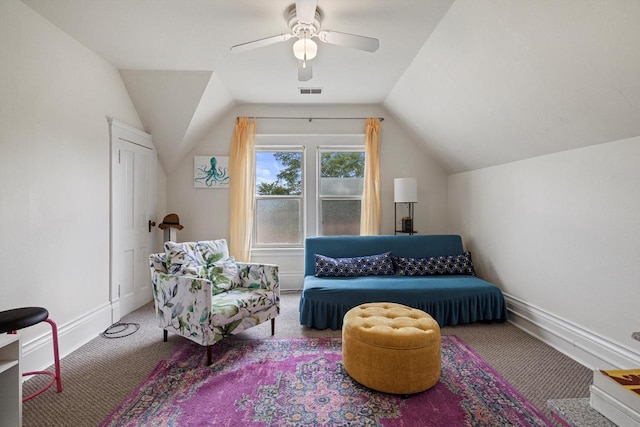 721 N St, Lake Geneva, WI 53147 - living area featuring vaulted ceiling, visible vents, carpet floors, and a ceiling fan