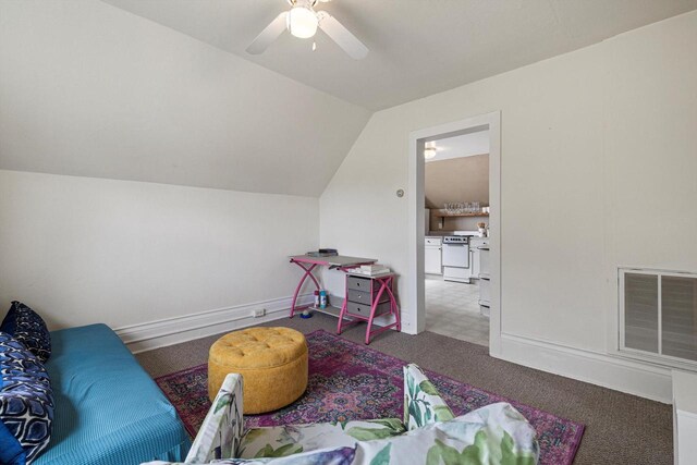 721 N St, Lake Geneva, WI 53147 - recreation room with visible vents, baseboards, a ceiling fan, lofted ceiling, and carpet floors