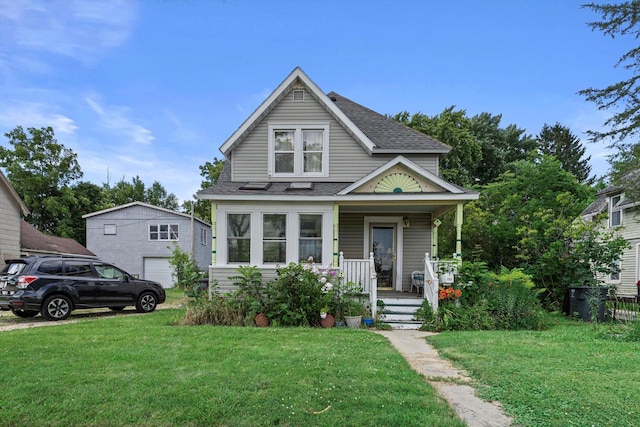 721 N St, Lake Geneva, WI 53147 - view of front of property with a front yard, a porch, and a shingled roof