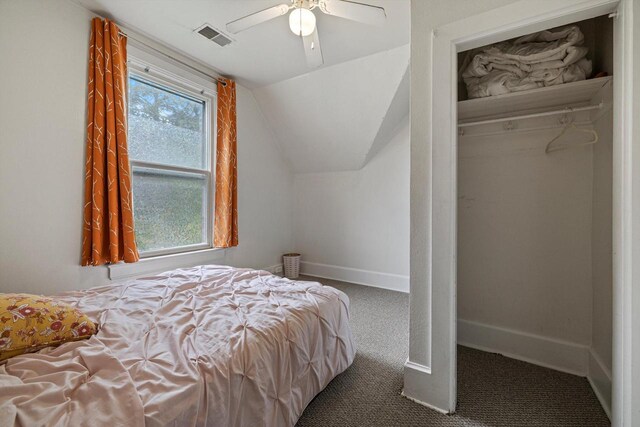 721 N St, Lake Geneva, WI 53147 - carpeted bedroom featuring baseboards, visible vents, ceiling fan, and lofted ceiling